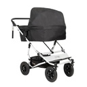 carrycot plus for twins installed on a Mountain Buggy duet double stroller shown from front side angle with sun hood up in place_black_black