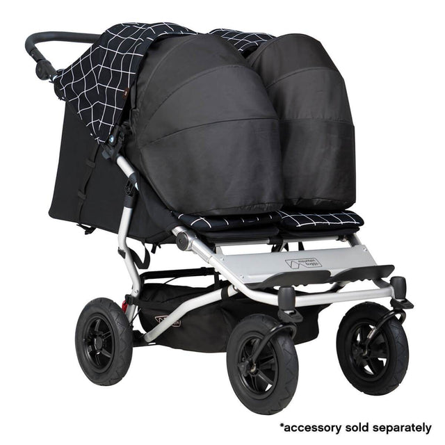 Mountain Buggy duet double buggy fitted with two newborn cocoons in colour grid_grid