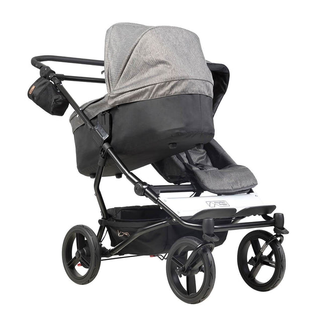 mountain buggy duet double buggy with one carrycot plus in incline mode 3/4 view shown in color herringbone_herringbone