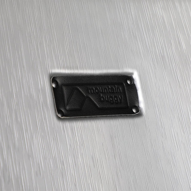 Mountain Buggy skyrider luxury close up of the premium luxury branding in leather_silver