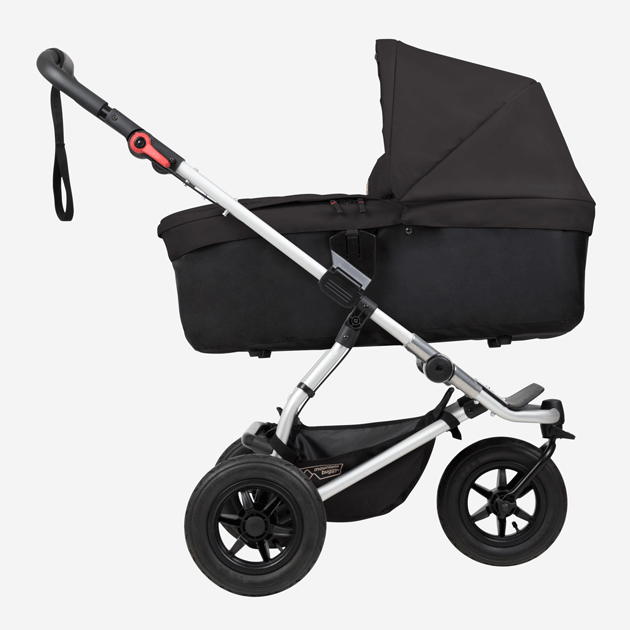 mountain buggy swift compact buggy with carrycot plus showing riding modes side view in color black_black