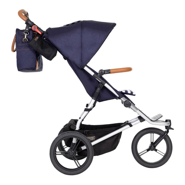 Mountain Buggy urban jungle luxury collection shown side on with included matching satchel attached to handlebar for convenience and ease of access_nautical