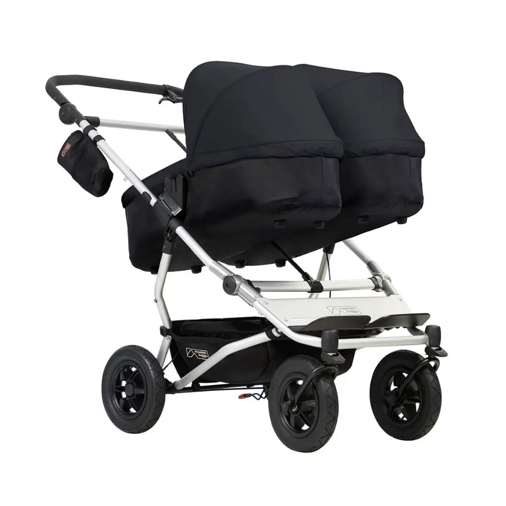 Mountain-Buggy-duet-buggy-with-double-black-carrycot-plus-in-incline-mode.webp