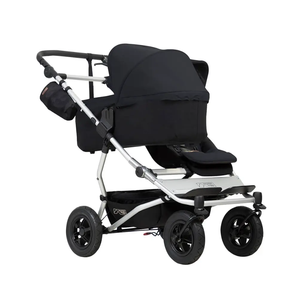 Mountain-Buggy-duet-buggy-with-single-black-carrycot-plus-in-lie-flat-mode.webp