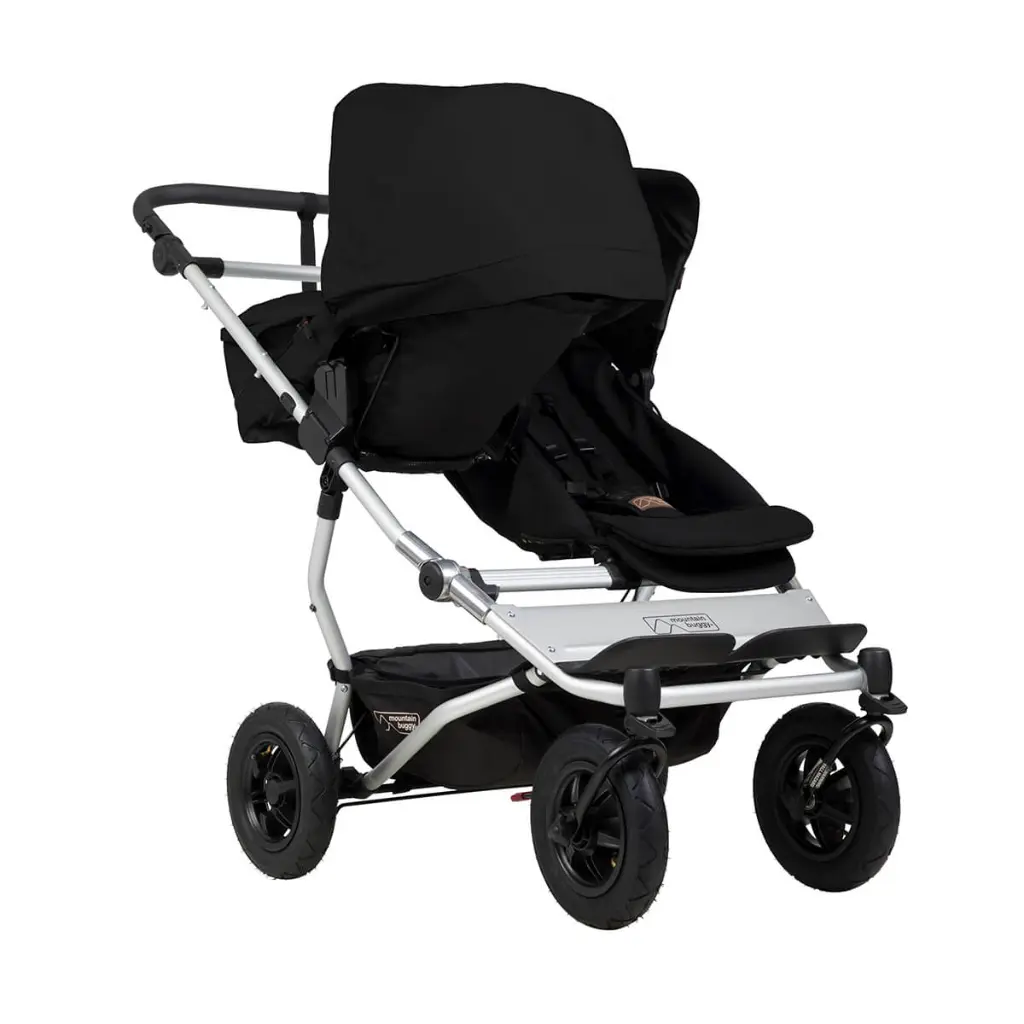 Mountain-Buggy-duet-buggy-with-single-black-carrycot-plus-in-parent-facing-mode.webp