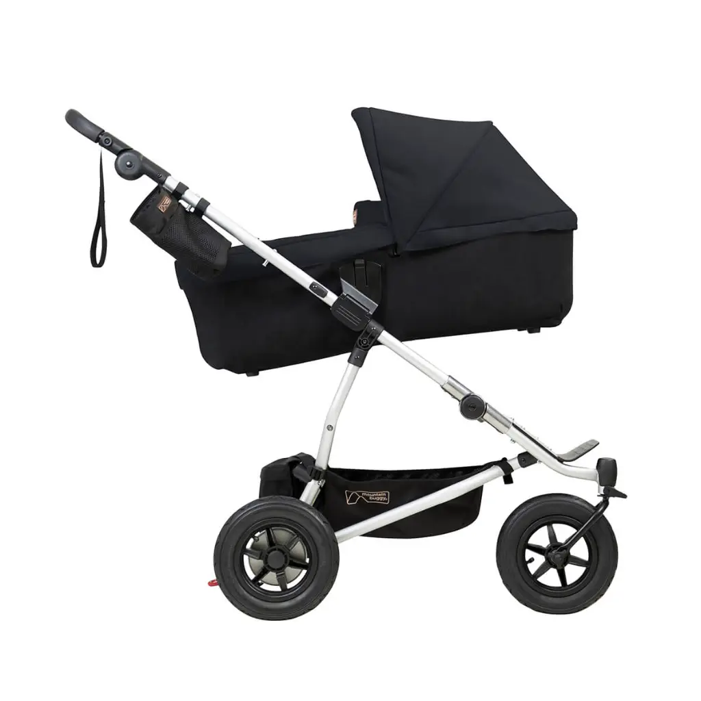 Mountain-Buggy-duet-buggy-with-double-black-carrycot-plus-in-incline-mode-side-view.webp