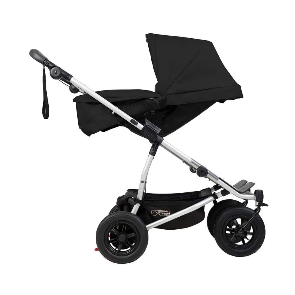 Mountain-Buggy-duet-buggy-with-double-black-carrycot-plus-in-parent-facing-mode-side-view.webp