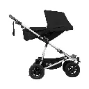 Mountain-Buggy-duet-buggy-with-double-black-carrycot-plus-in-parent-facing-mode-side-view.webp