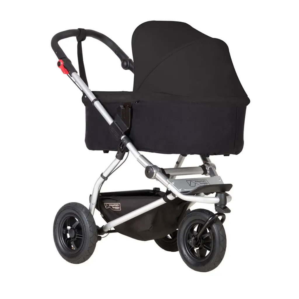 Mountain-Buggy-black-carrycot-plus-on-swift-buggy-in-lie-flat-mode.webp