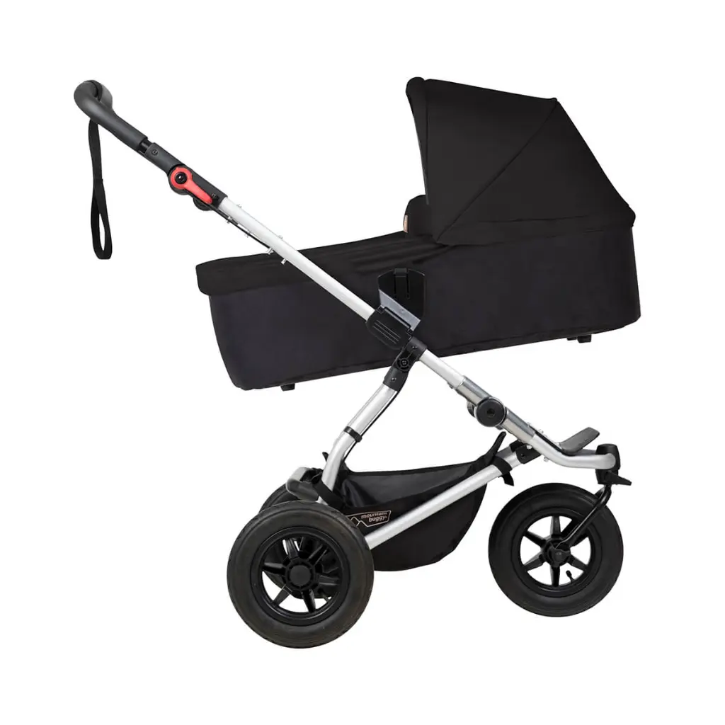 Mountain-Buggy-black-carrycot-plus-on-swift-buggy-in-incline-mode.webp