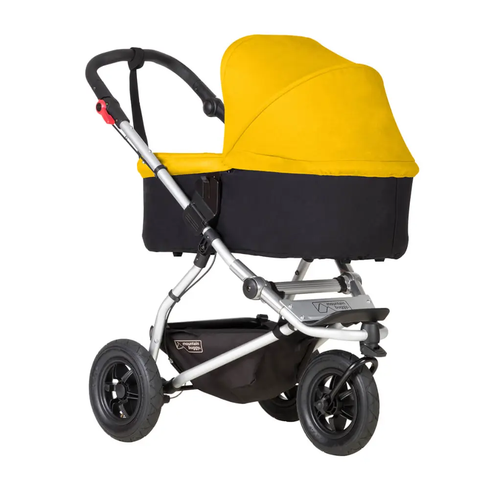 Mountain-Buggy-gold-carrycot-plus-on-swift-buggy-in-lie-flat-mode.webp