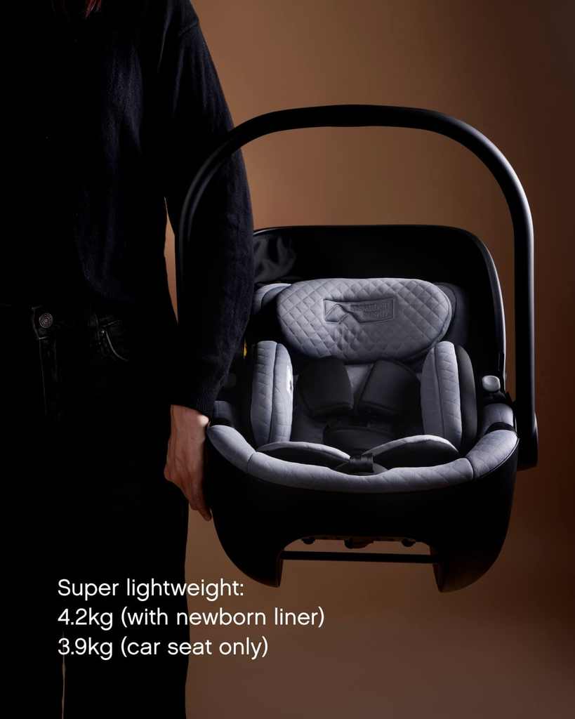 mountain-buggy-nest-car-seat-capsule-without-base-parent-carrying-handle-front-view.webp